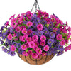 A hanging basket filled with artificial morning glory and eucalyptus flower stems in shades of purple and pink.