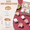 A set of miniature white resin coffee mugs with latte art displayed on a red background.