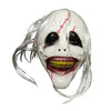 A realistic latex horror mask with pale skin, white hair, and a wide, bloody grin.