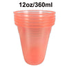 Une tasse en plastique orange clair avec un rebord côtelé et un corps effilé.