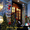 A Christmas ladder light decoration featuring Santa Claus climbing a lighted ladder in front of a wooden door.