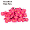 A pile of bright pink artificial rose red flowers, size 4cm.