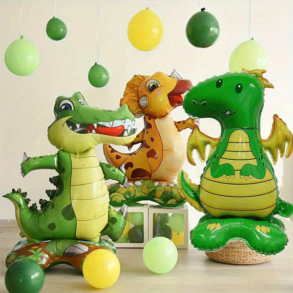 Eine Sammlung von Folien-Tierballons mit grünen und gelben Dinosauriern und anderen Tieren.