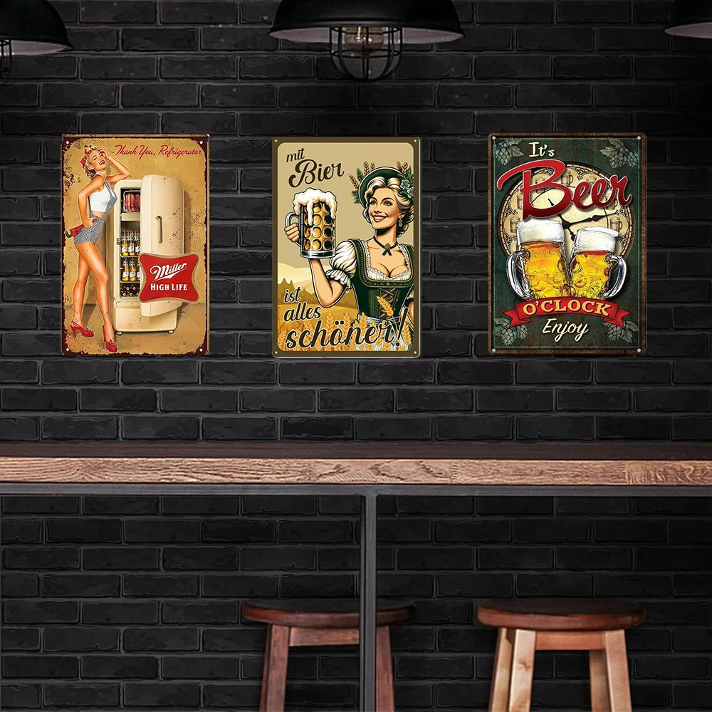 Three vintage metal tin signs featuring beer themes and illustrations for wall decor