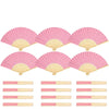 A set of pink paper hand fans with gift bags and thank you cards
