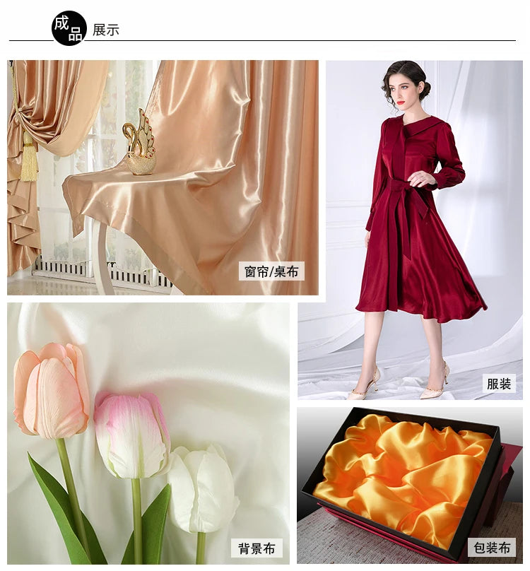 A display of satin fabric in various shades of pink and orange, including floral patterns and solid colors for sewing project