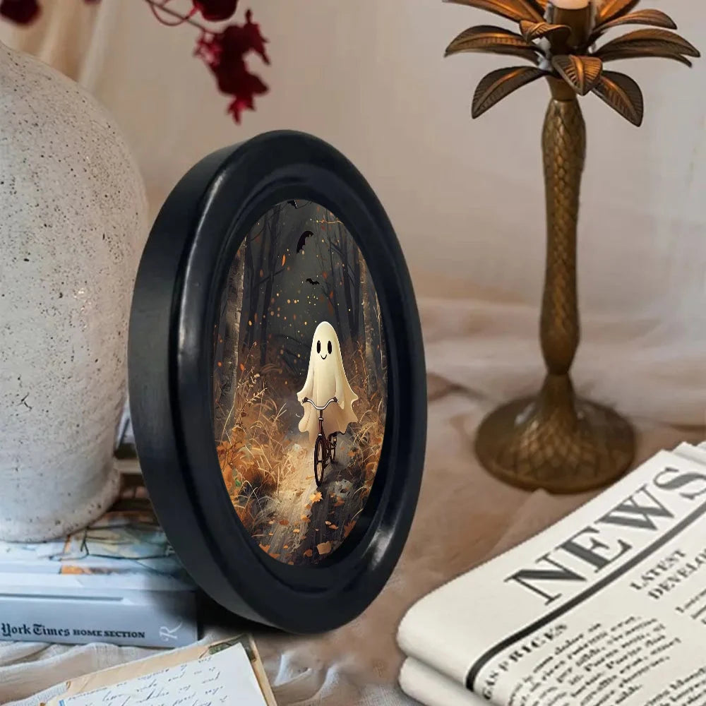 Oval wooden wall art depicting a white ghost in a dark forest setting.