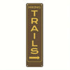 Vintage metal sign with the word TRAILS on it, used for hiking or trail context.