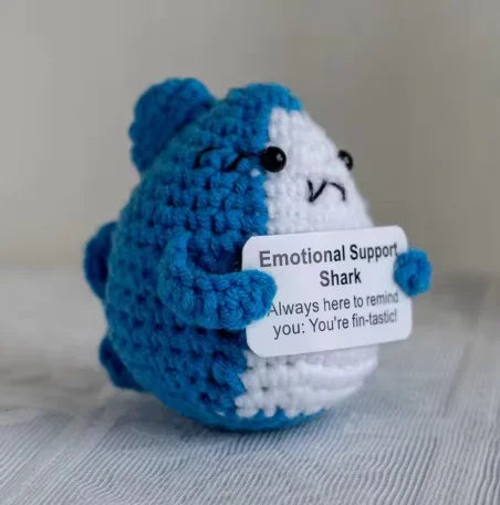 Handmade plush knitting doll shaped like a shark with blue and white coloring, offering emotional support.