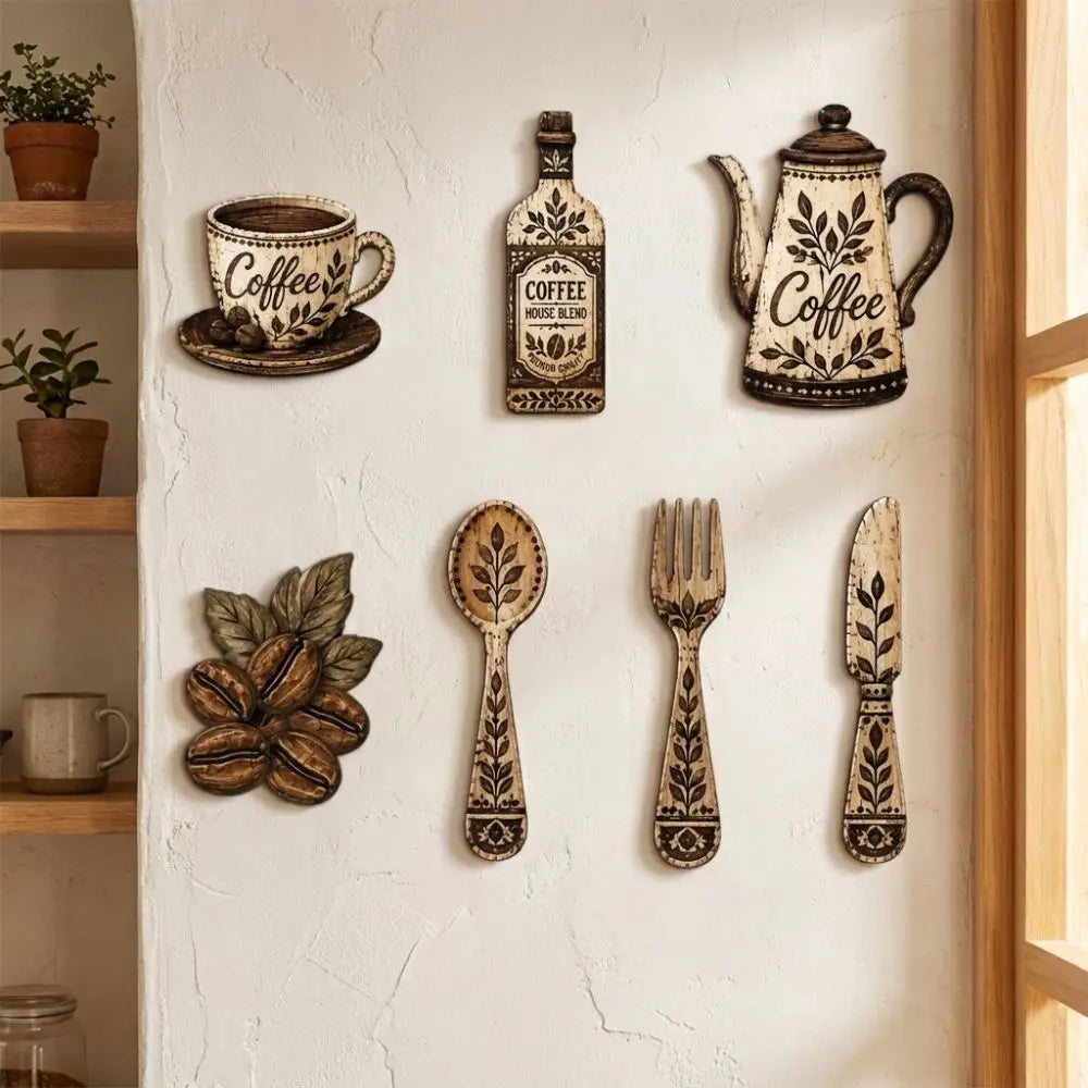 A vintage wooden coffee utensil set displayed on a white wall, featuring a coffee pot, mill, and spoon.