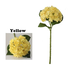 A single stem of yellow artificial hydrangea flowers.