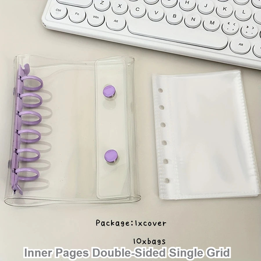 Clear plastic binder cover with purple accents and a white inner page protector for collectibles