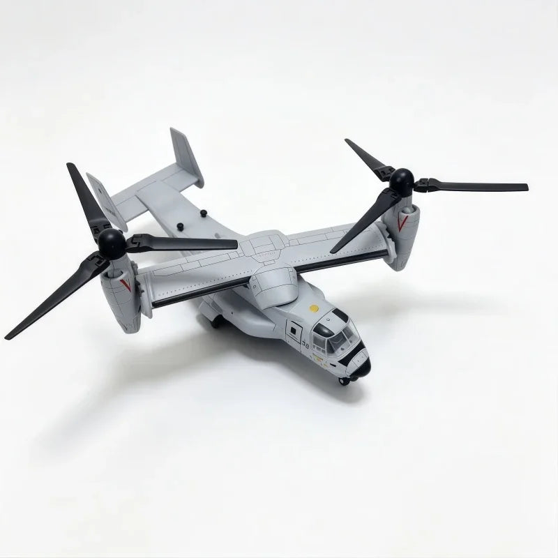 A gray V-22 Osprey tiltrotor model built from building blocks.