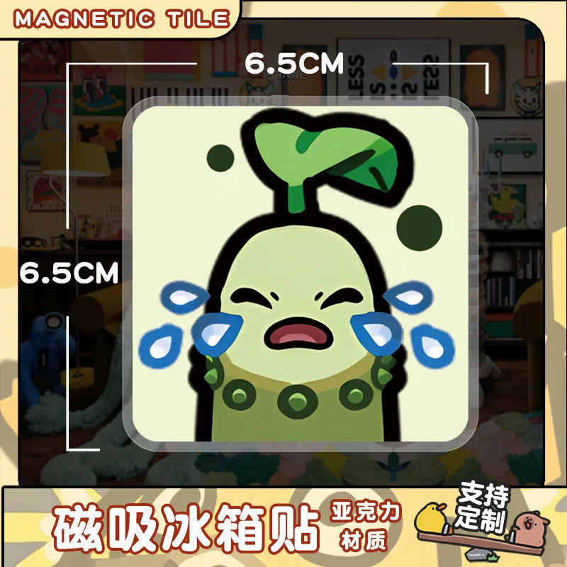 A cute, green, squishy-looking character design for a magnetic tile or fridge magnet.