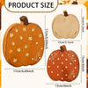Three wooden pumpkin figurines in orange and natural tones shown with size measurements.