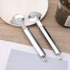 A pair of silver Nopal cactus peeler and cutter tools resting on a light surface.