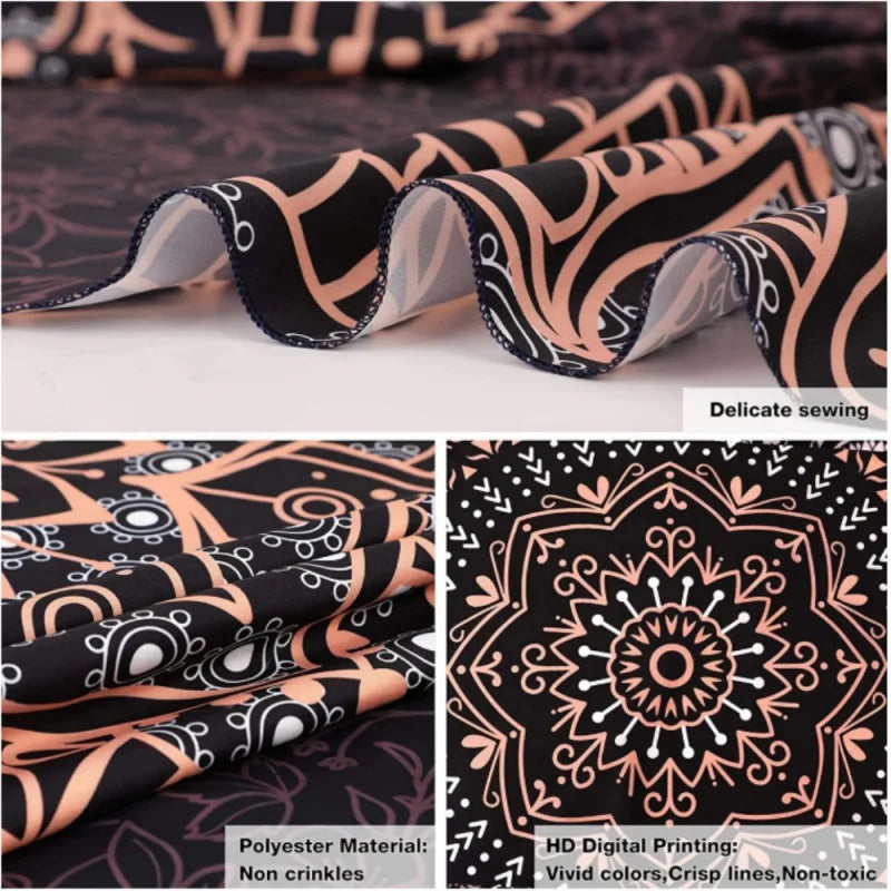 Close-up of a black and orange patterned fabric featuring delicate stitching and intricate designs.