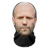 A realistic 3D printed horror balaclava mask worn by a man with a shaved head and beard.