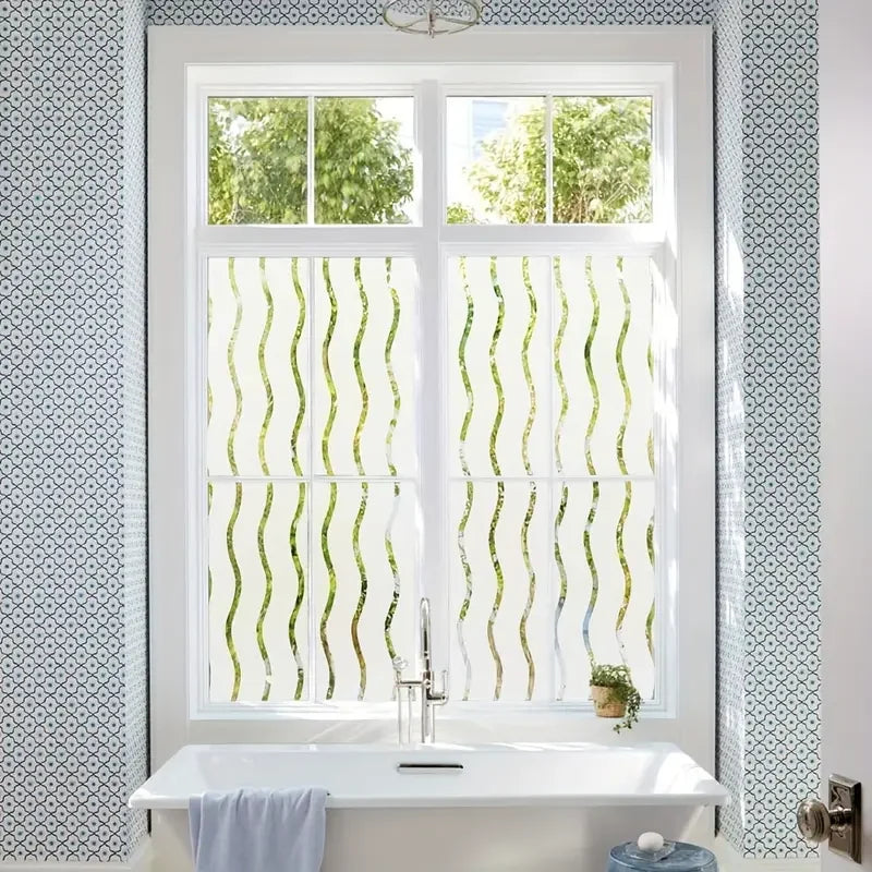A white vanity with a window featuring a frosted electrostatic film that allows light through while maintaining privacy.