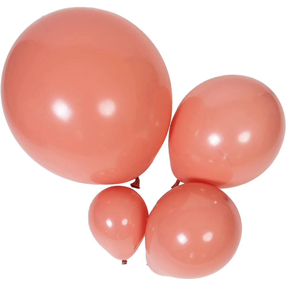 A cluster of smooth, matte pink latex balloons for weddings and celebrations.
