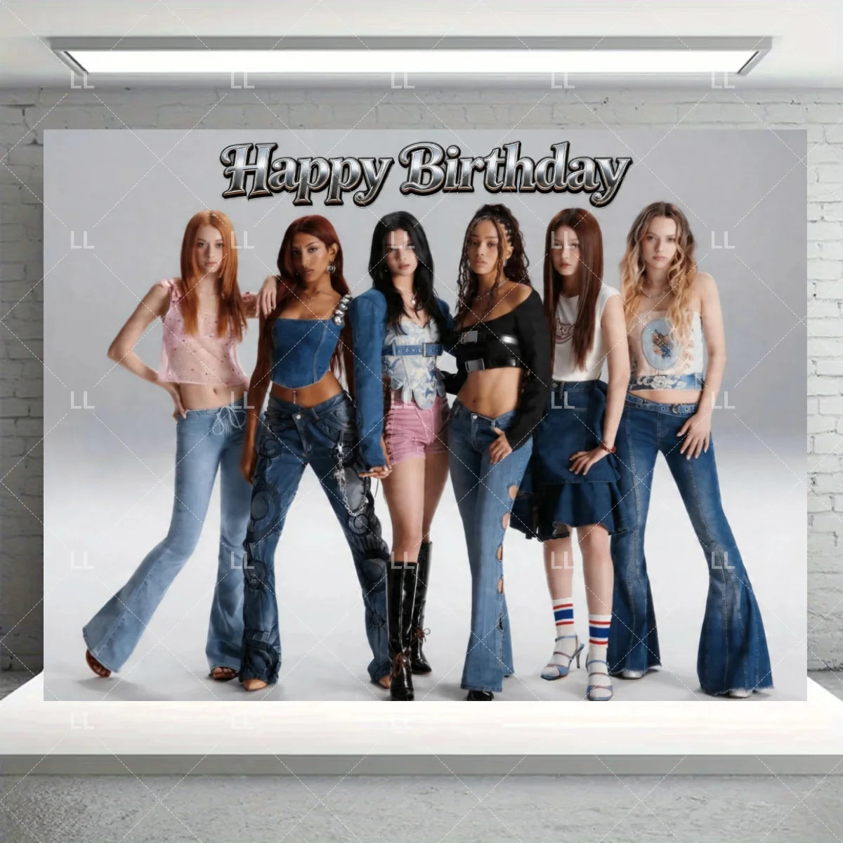 A photo of six young women posing in front of a birthday sign with the text Happy Birthday.