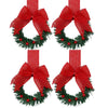 Red velvet bow Christmas wreath with artificial berries