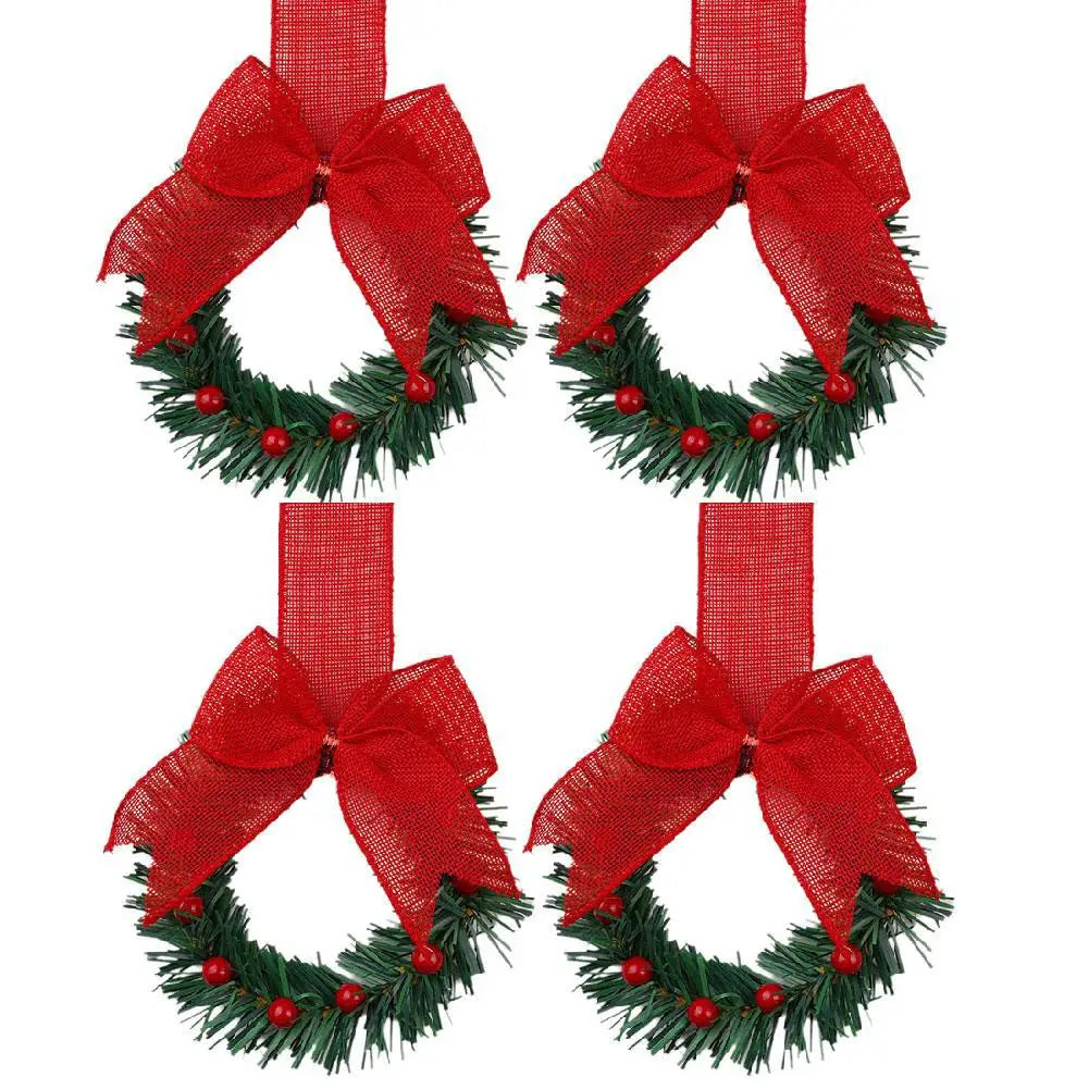Red velvet bow Christmas wreath with artificial berries