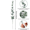 A vertical illustration showing the size and texture of artificial eucalyptus stems and leaves.