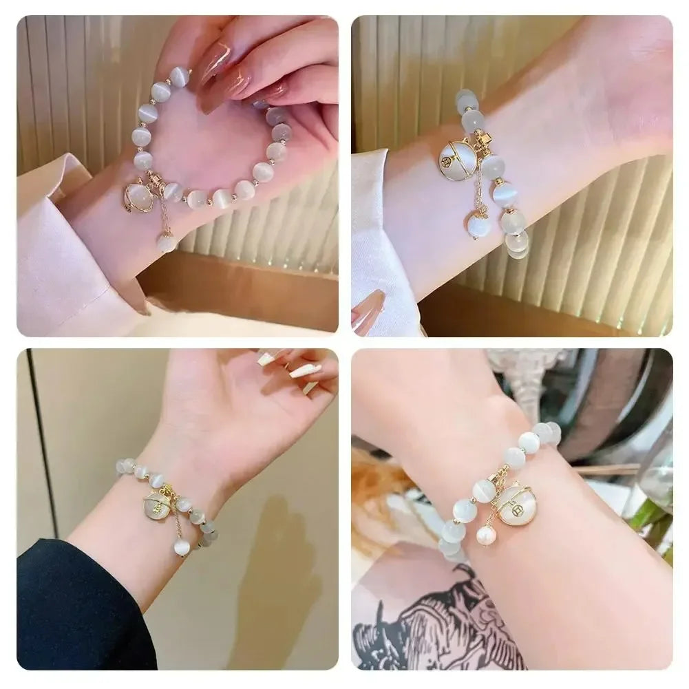 Close-up shots of a natural stone lily of the valley bracelet worn on wrists.