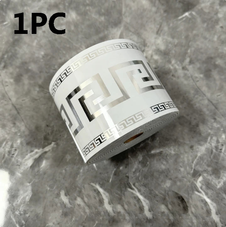 One roll of self-adhesive PVC baseboard trim featuring a decorative brick pattern in silver and white.