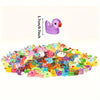 A pile of colorful luminous resin animal figurines, including ducks and other creatures, for aquarium decor.