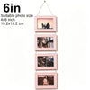 A set of five pink wooden collage photo frames displayed vertically on a string for wall mounting.