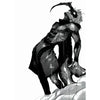 A dark, muscular figure with spiky hair and a prominent horn is depicted in a dynamic pose.