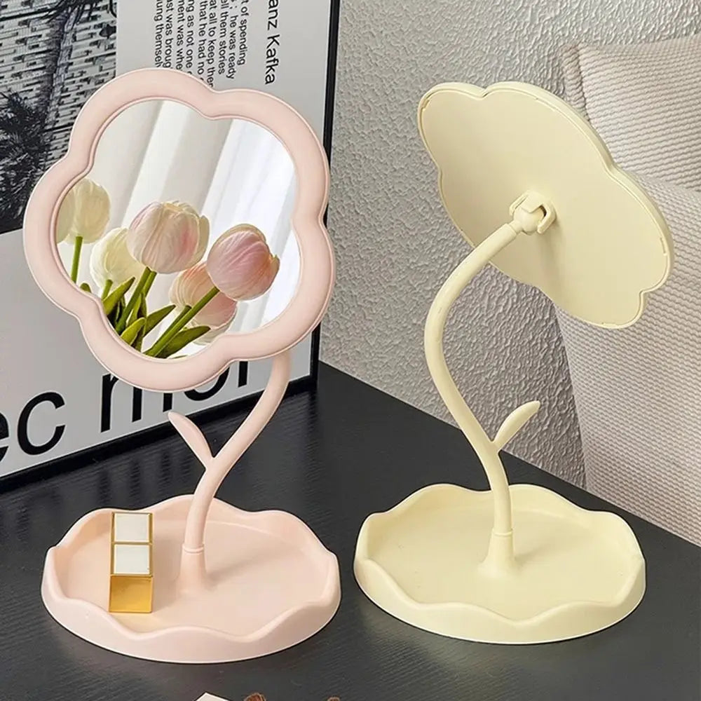 A pink sunflower heart dressing makeup mirror with a light yellow stand and mirror.