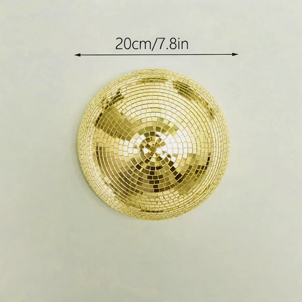 Round gold disco ball wall decor with a 20cm diameter.
