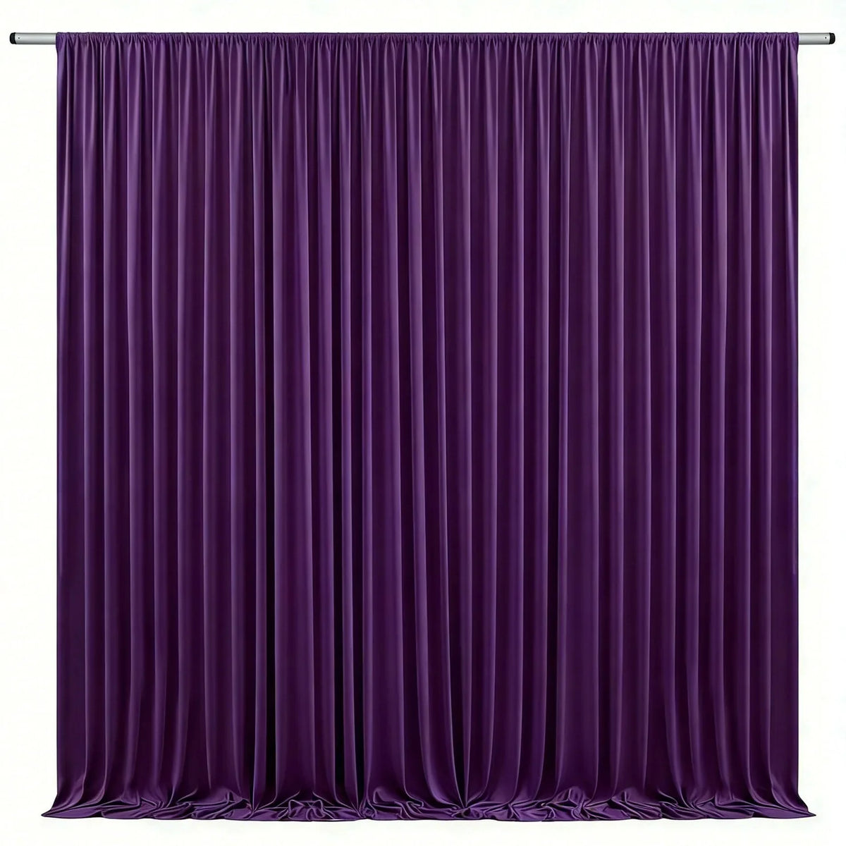 A floor-to-ceiling purple pleated drapery backdrop for events