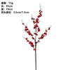 A branch of red plum blossoms with stems, showing the flowers and branches.