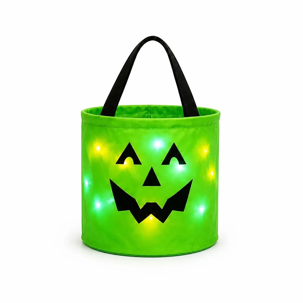 A bright green glowing pumpkin candy bucket with a black LED handle.