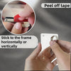 Hands demonstrate how to stick a photo frame horizontally or vertically onto the car sunshade using peel off tape.