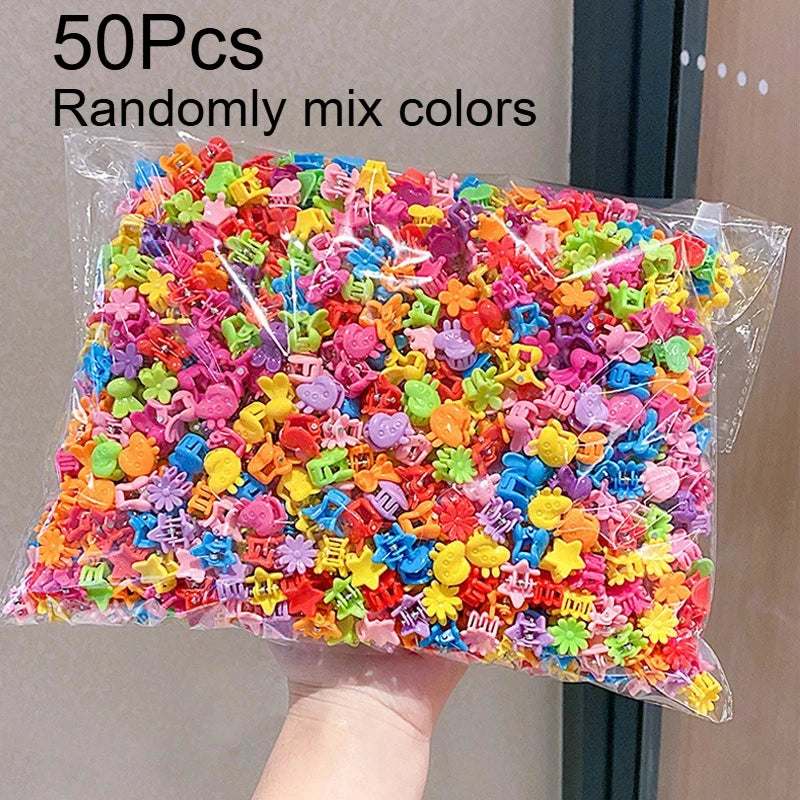 A plastic bag filled with 50 colorful flower and star hair claw clips for kids