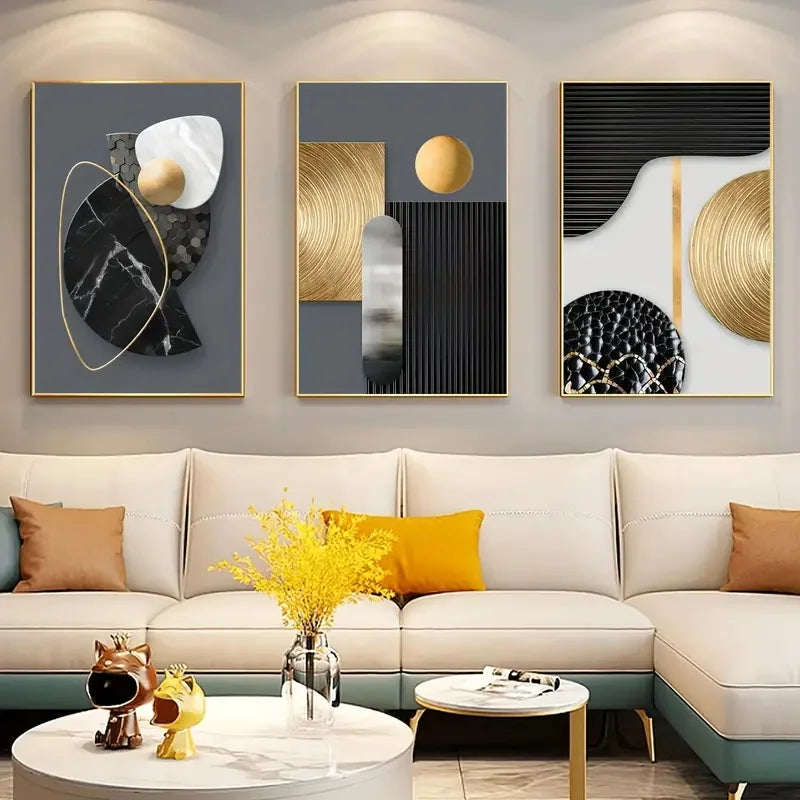 A set of three abstract marble geometry canvas art pieces displayed on a wall above a modern sofa.