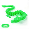 A bright green gecko figurine made of resin, shaped like a dragon, used for terrariums and decor.
