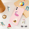 A pink smartphone decorated with various summer-themed stickers including a flamingo, watermelon slice, sunglasses, and a sur