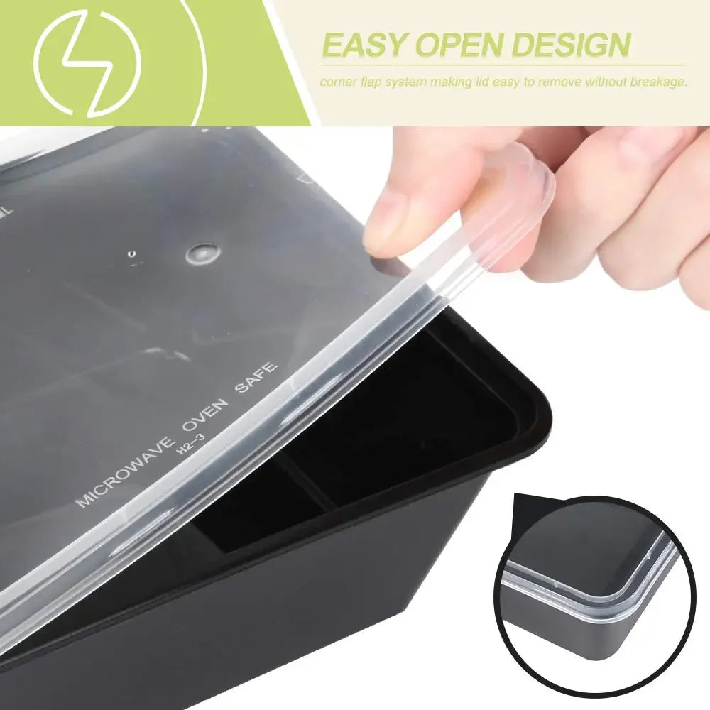 A hand is opening a black plastic food storage container with an easy open design feature.