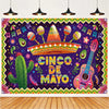 A vibrant Mexican fiesta photo backdrop featuring a sombrero, guitar, and cactus design on a purple background.