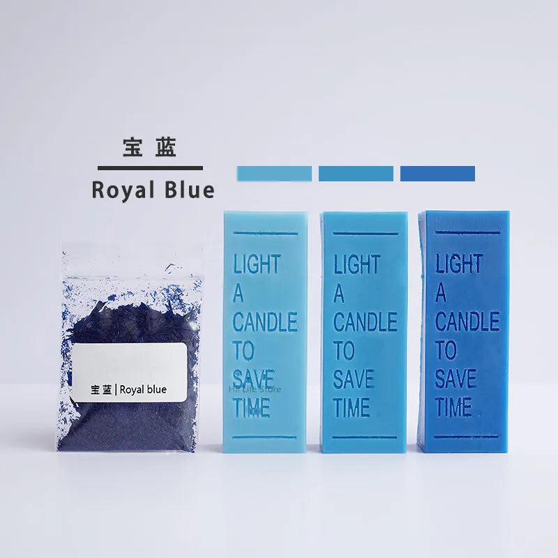 Royal Blue candle dye colorants in a clear jar and three glass tubes showing the color.
