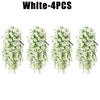 Four bunches of white artificial morning glory hanging vines used for floral decoration