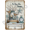 A vintage metal tin sign depicting a rustic scene with bare branches, a candle, a bird, and a star on a wooden surface.