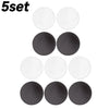 A set of five round clear acrylic fridge magnets in black and white finishes.
