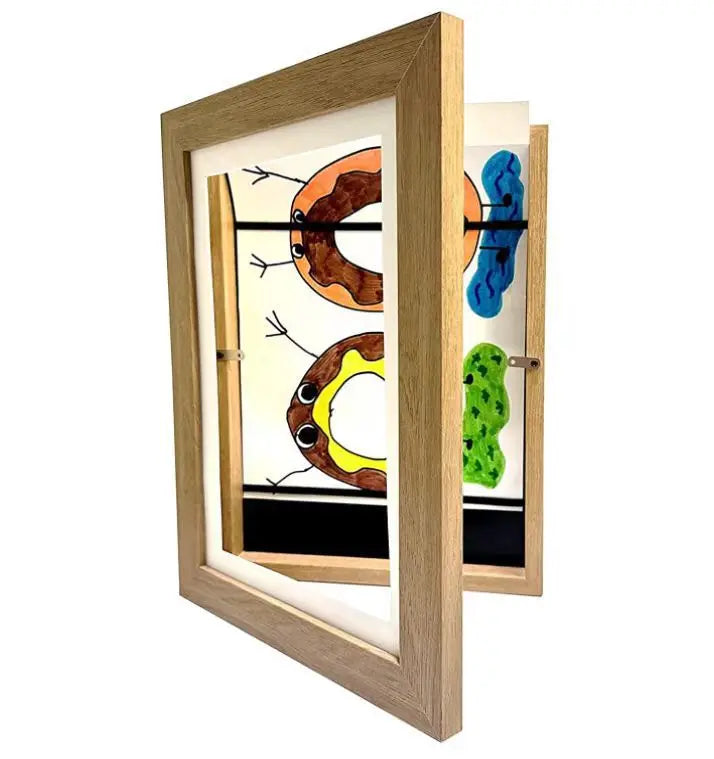 A wooden frame displaying magnetic front opening art with colorful abstract shapes.